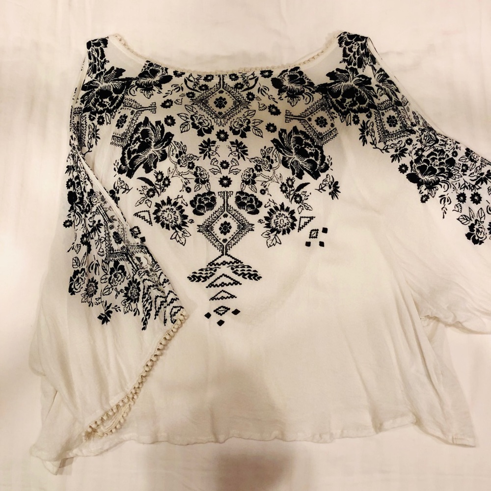 URBAN OUTFITTERS open back and open sleeved top